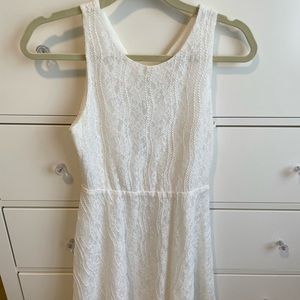MM Couture Size White short dress with open back. Size Small